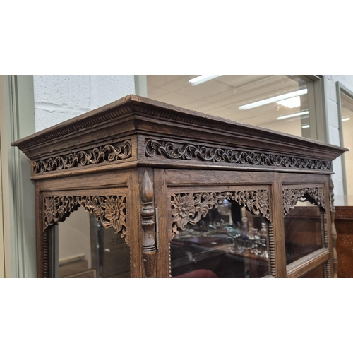 461 - THIA GLAZED CARVED TEAK CABINET, 100cm W x 171cm H x 45cm D.