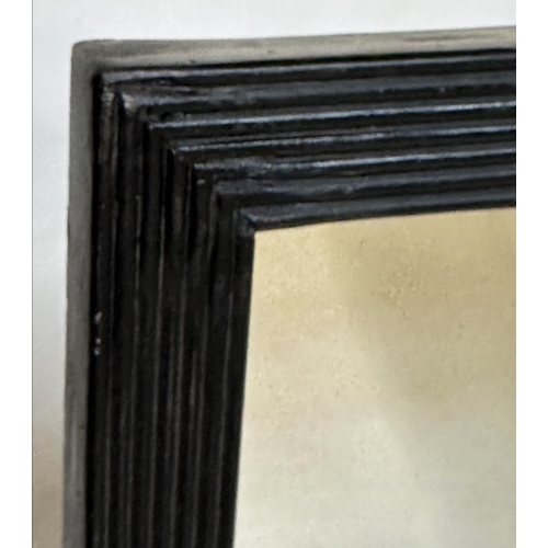 483 - WALL MIRROR, early 19th century English Regency, with reeded gesso ebonised frame, 63cm W x 76cm H.