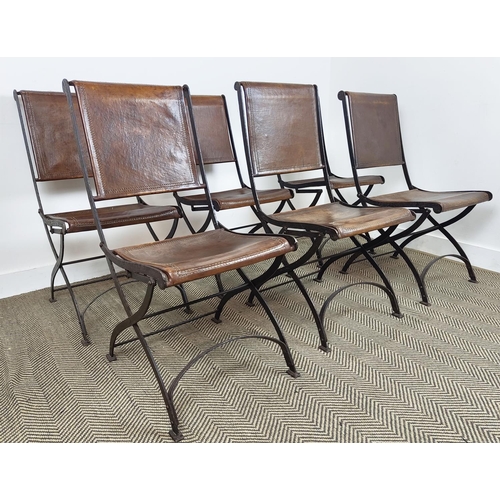 489 - DINING CHAIRS, a set of six, mid century Italian stitched tan leather with folding iron bases, 95cm ... 