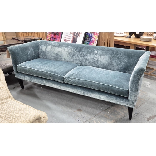 520 - SOFA, with turquoise velvet upholstery, on black tapered supports, 76cm H x 210cm x 77cm.