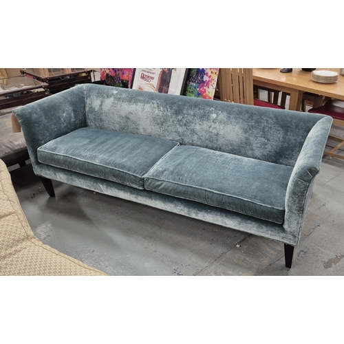 520 - SOFA, with turquoise velvet upholstery, on black tapered supports, 76cm H x 210cm x 77cm.