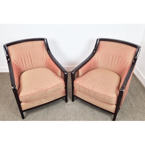 539 - ARMCHAIRS, a pair, in a patterned peach fabric with showframes, each 72cm W. (2)