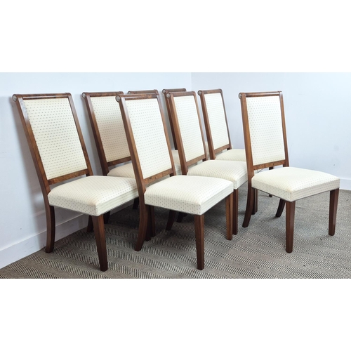 543 - DINING CHAIRS, a set of eight, tall backed with burr walnut top bar and metal roulette detail, by re... 