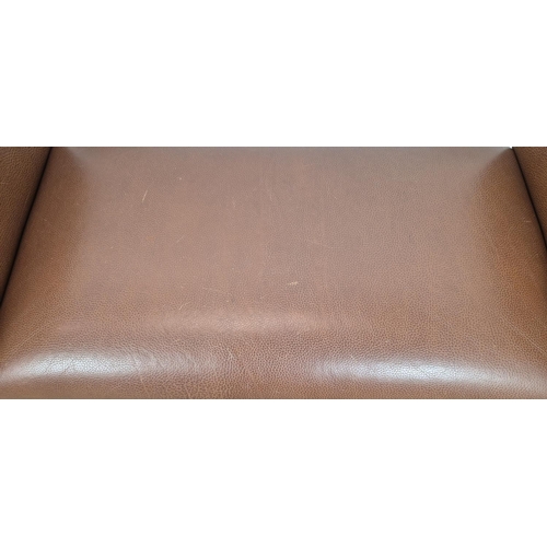 547 - NOBILIS WINDOW SEAT, tan leather upholstery on turned wooden supports, 74cm H x 120cm x 48cm.