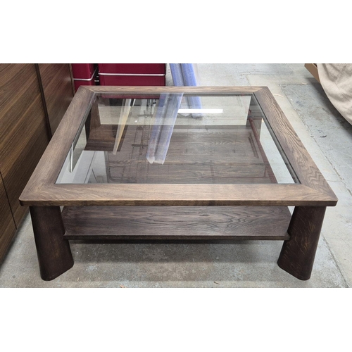 549 - COFFEE TABLE, with a glass top and wooden frame and undertier, 110cm x 110cm x 42cm H.