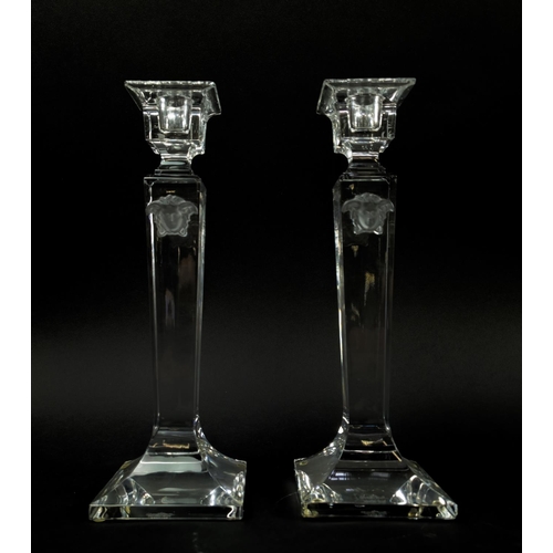 72 - VERSACE ROSENTHAL GLASS CANDLESTICKS, a pair, square form, signed to bases, 25cm H. (2)