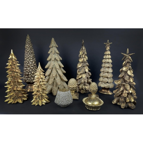 94 - ORNAMENTAL GILT CHRISTMAS DECORATIONS, comprising seven trees, two acorn finials, a lidded dish and ... 