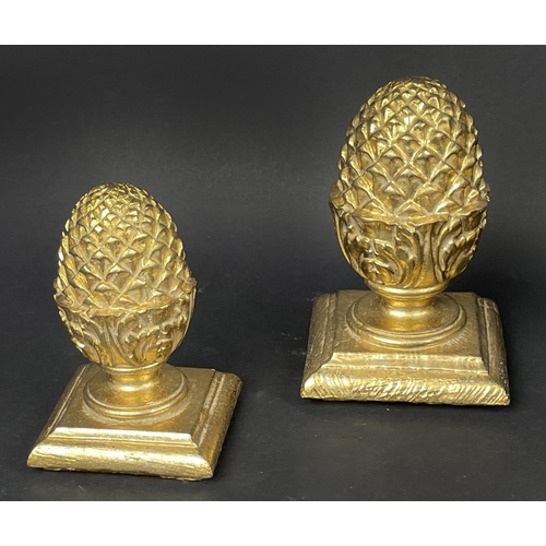 94 - ORNAMENTAL GILT CHRISTMAS DECORATIONS, comprising seven trees, two acorn finials, a lidded dish and ... 