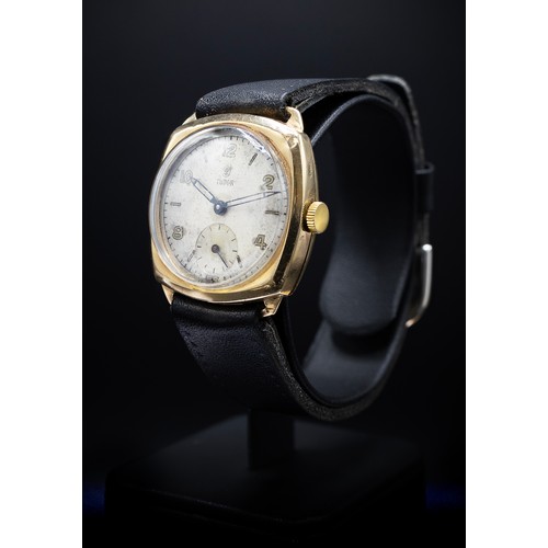 100 - A TUDOR 9CT YELLOW GOLD DENNISON WRISTWATCH, 1940's, with a cushion shaped case and sword shaped han... 