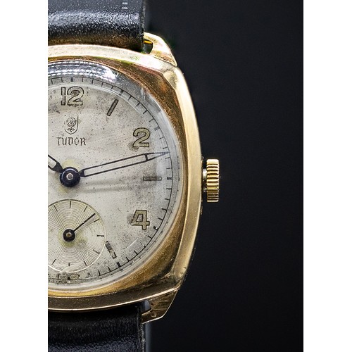 100 - A TUDOR 9CT YELLOW GOLD DENNISON WRISTWATCH, 1940's, with a cushion shaped case and sword shaped han... 