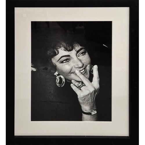 145A - RICHARD YOUNG, 'Elizabeth Taylor, Belgravia London, 1975', silver gelatin print, 54cm x 37cm, signed... 