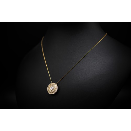 125 - AN 18CT YELLOW GOLD DIAMOND PENDANT NECKLACE, the circular pendant set with a seven stone diamond cl... 