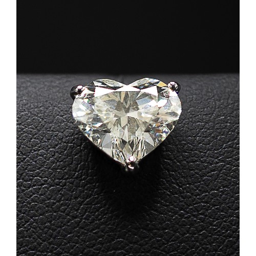 126 - A PAIR OF 18CT WHITE GOLD HEART SHAPED DIAMOND SOLITAIRE STUD EARRINGS, each brilliant cut stone of ... 