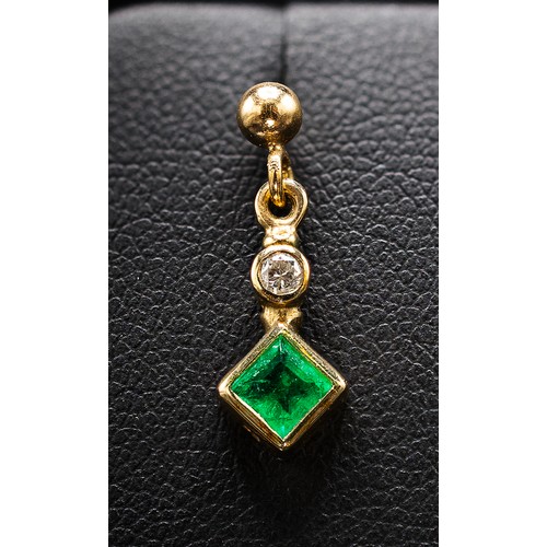 128 - A PAIR OF 9CT GOLD EMERALD AND DIAMOND DROP EARRINGS, each with a square cut emerald individually mo... 