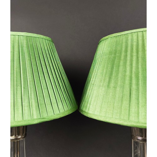 551 - TABLE LAMPS, a pair, with glass columns and plated collars, each 62cm H including green pleated shad... 