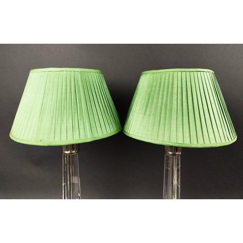 551 - TABLE LAMPS, a pair, with glass columns and plated collars, each 62cm H including green pleated shad... 