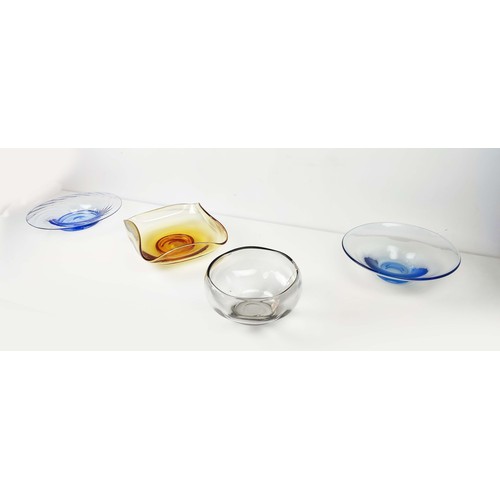 96 - FOUR WHITEFRIARS GLASS BOWLS, in amber, blue and smokey quartz coloured glass, various sizes. (4)