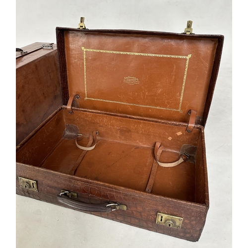 292 - SUITCASES,  two, vintage crocodile with gilt brass mounts together with a leather fitted shoe case. ... 