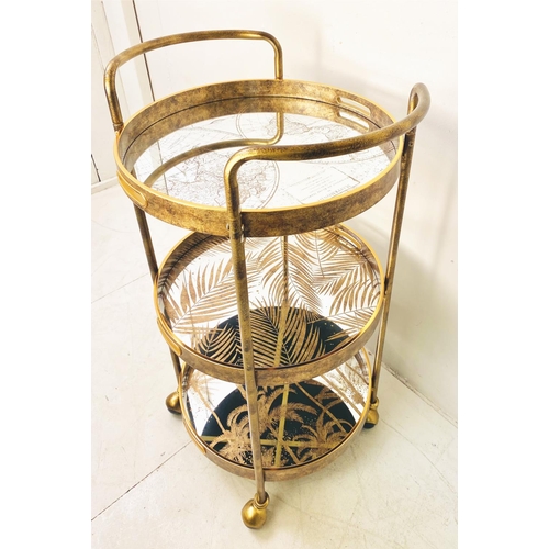 497 - DRINKS TROLLEY, gilt metal with three glazed tiers with palm tree decoration, 87cm H x 47cm W x 45cm... 