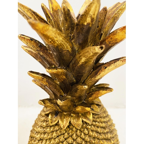 499 - DECORATIVE PINEAPPLES, a set of four, gilt finish, 32cm H x 27cm W x 17cm D. (4)