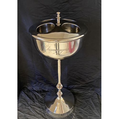 507 - CHAMPAGNE WINE COOLER ON STAND, polished metal, to hold four bottles.