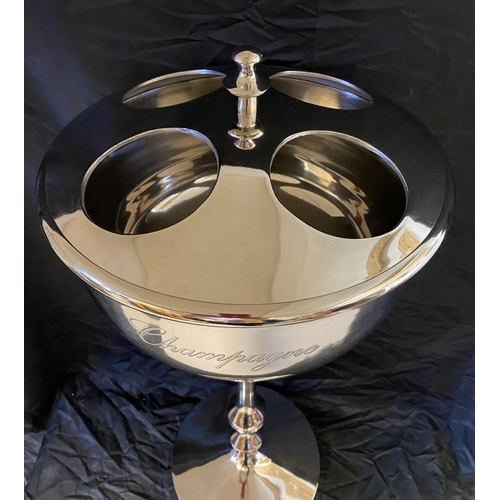 507 - CHAMPAGNE WINE COOLER ON STAND, polished metal, to hold four bottles.