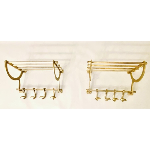 509 - LUGGAGE RACKS, a pair, gilt metal, each with four hangers, 35cm H x 46cm W x 27cm. (2)