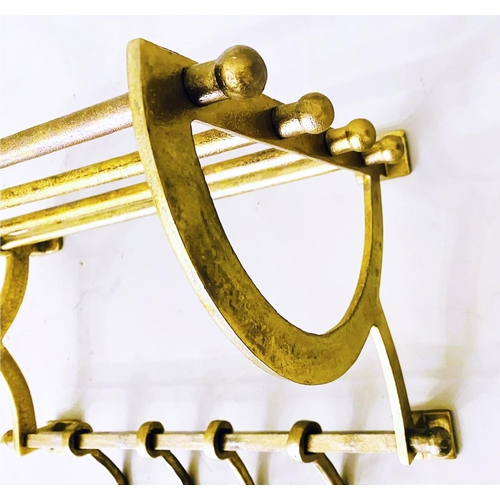 509 - LUGGAGE RACKS, a pair, gilt metal, each with four hangers, 35cm H x 46cm W x 27cm. (2)