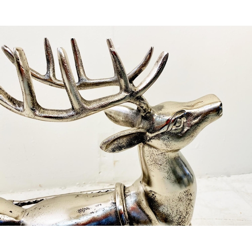 512 - FESTIVE CHAMPAGNE ICE BUCKET, in the form of a reindeer pulling a sleigh, 48cm H x 70cm W x 25cm D.