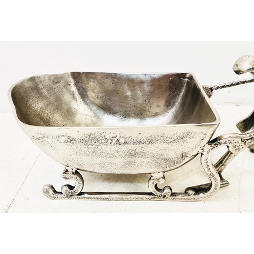 512 - FESTIVE CHAMPAGNE ICE BUCKET, in the form of a reindeer pulling a sleigh, 48cm H x 70cm W x 25cm D.