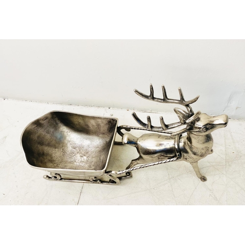 512 - FESTIVE CHAMPAGNE ICE BUCKET, in the form of a reindeer pulling a sleigh, 48cm H x 70cm W x 25cm D.