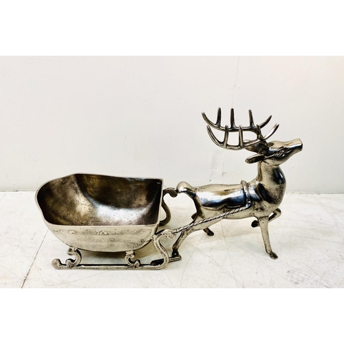 512 - FESTIVE CHAMPAGNE ICE BUCKET, in the form of a reindeer pulling a sleigh, 48cm H x 70cm W x 25cm D.