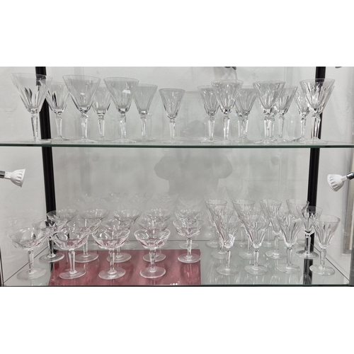 58 - WATERFORD CUT GLASSES, comprising six large wine glasses, eleven wine glasses, twelve small glasses,... 