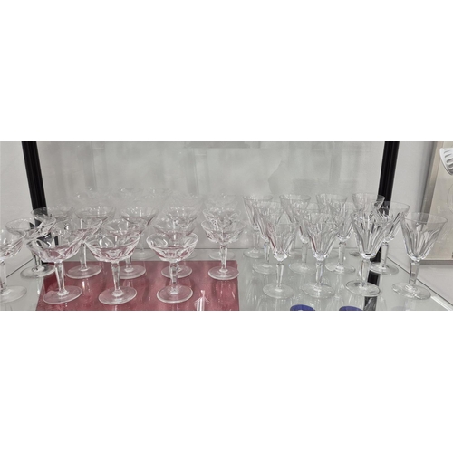 58 - WATERFORD CUT GLASSES, comprising six large wine glasses, eleven wine glasses, twelve small glasses,... 