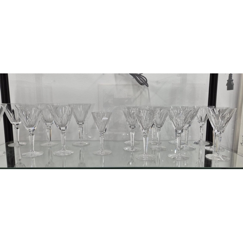 58 - WATERFORD CUT GLASSES, comprising six large wine glasses, eleven wine glasses, twelve small glasses,... 