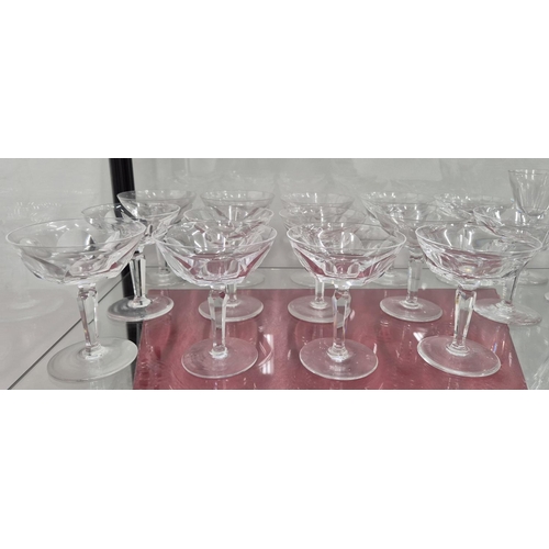 58 - WATERFORD CUT GLASSES, comprising six large wine glasses, eleven wine glasses, twelve small glasses,... 