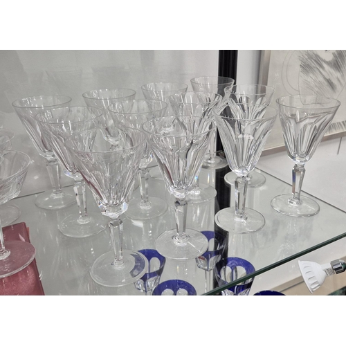 58 - WATERFORD CUT GLASSES, comprising six large wine glasses, eleven wine glasses, twelve small glasses,... 