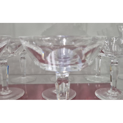 58 - WATERFORD CUT GLASSES, comprising six large wine glasses, eleven wine glasses, twelve small glasses,... 