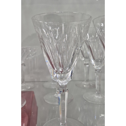 58 - WATERFORD CUT GLASSES, comprising six large wine glasses, eleven wine glasses, twelve small glasses,... 