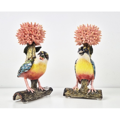 77 - ARDMORE DESIGN WEAVER BIRD CANDLESTICKS, a pair, modelled perched on branches, signed, made by Betty... 