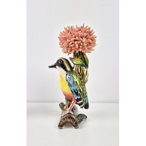 77 - ARDMORE DESIGN WEAVER BIRD CANDLESTICKS, a pair, modelled perched on branches, signed, made by Betty... 