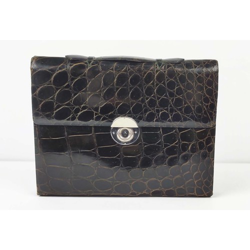 52 - LADIES TRAVEL PORTFOLIO, Aspinal style crocodile skin with Moroccan red leather interior.