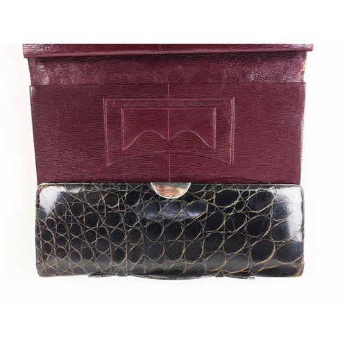 52 - LADIES TRAVEL PORTFOLIO, Aspinal style crocodile skin with Moroccan red leather interior.