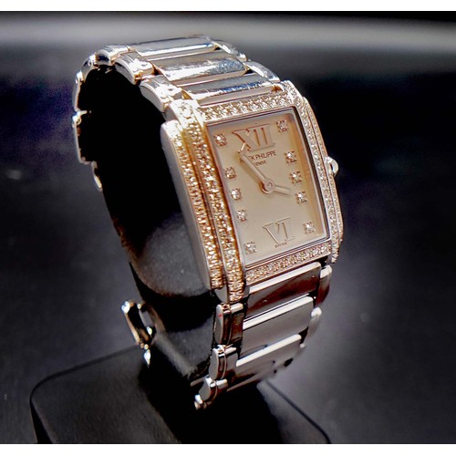 100A - A PATEK PHILIPPE 18CT WHITE GOLD AND DIAMOND SET WRISTWATCH, Geneve, set with approximately 88 round... 