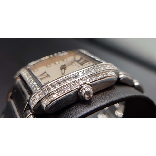 100A - A PATEK PHILIPPE 18CT WHITE GOLD AND DIAMOND SET WRISTWATCH, Geneve, set with approximately 88 round... 