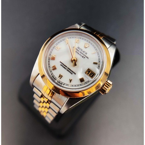 105A - A ROLEX OYSTER PERPETUAL DATEJUST LADIES WRISTWATCH, Champagne dial with Roman numerals, steel and g... 