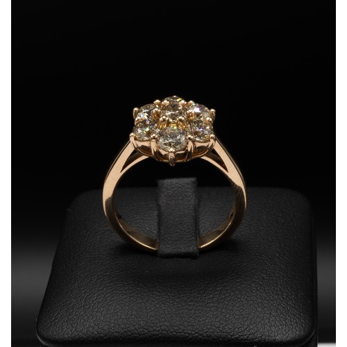 102 - AN 18CT ROSE GOLD SEVEN STONE DIAMOND CLUSTER RING, the round brilliant cut diamonds of 2.15 carats,... 