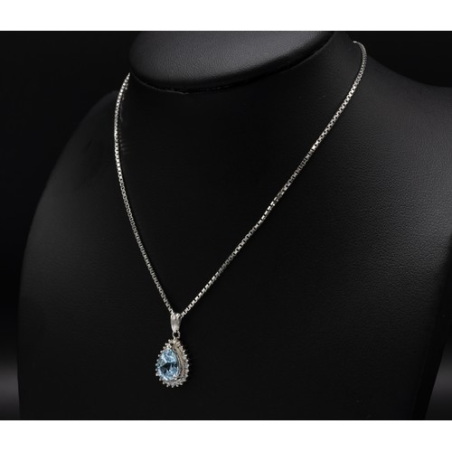 109 - PLATINUM PEAR SHAPED PENDANT, set with a pear shaped aquamarine and a halo of round brilliant cut di... 