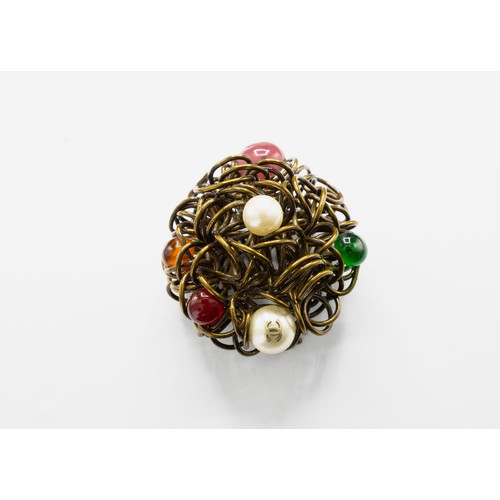 28A - CHANEL BROOCH, bronze tone metal with encrusted faux pearls and stones, with safety pin closure, wit... 