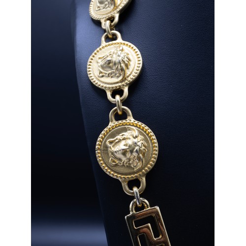 34 - GIANNI VERSACE VINTAGE BELT, circa 1990's, adjustable clasp closure, gold metal Medusa emblem chain ... 